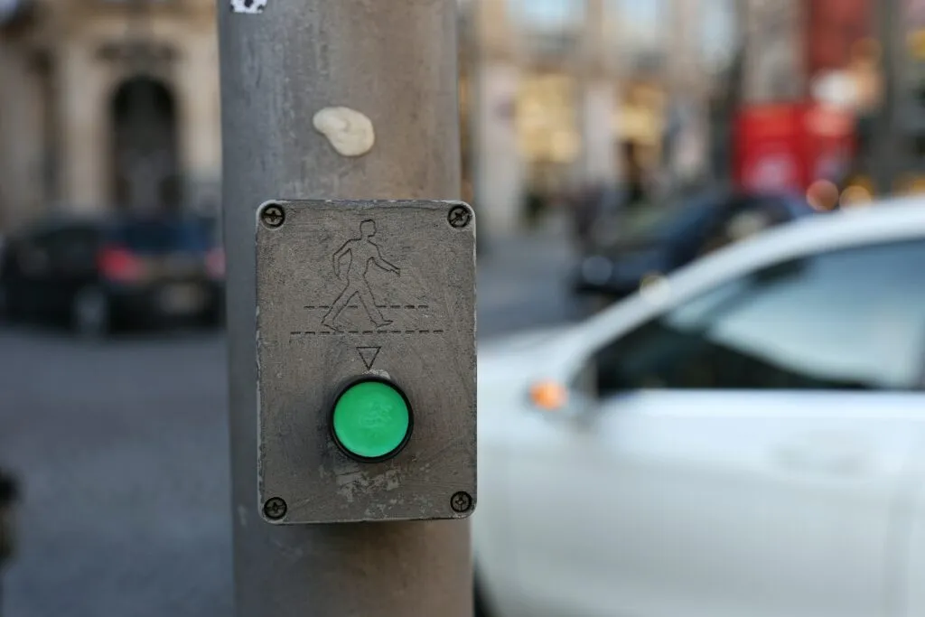 Picture of a button on a pedestrian crossing